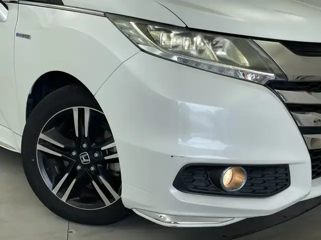 ホンダ オデッセイ ハイブリッド アブソルートセンシングアドバンP 新潟県 2016(平28)年 6.6万km ホワイトオーキッドパール メーカー純正インターナビ/(CD.DVD.フルセグ.Bluetooth)/全方位カメラ/革巻きステアリング/ステアリングリモコン/LEDオートライト/フォグランプ/ホンダセンシング/レーダークルーズコントロール/レーンキープアシスト/ハーフレザーシート/運転席パワーシート/EVモード/電動格納ウィンカーミラー/ECON/プッシュスタート/スマートキー×2/純正フロアマット