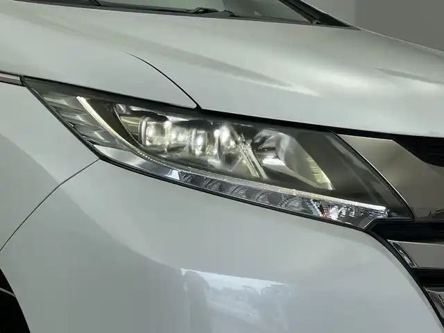 ホンダ オデッセイ ハイブリッド アブソルートセンシングアドバンP 新潟県 2016(平28)年 6.6万km ホワイトオーキッドパール メーカー純正インターナビ/(CD.DVD.フルセグ.Bluetooth)/全方位カメラ/革巻きステアリング/ステアリングリモコン/LEDオートライト/フォグランプ/ホンダセンシング/レーダークルーズコントロール/レーンキープアシスト/ハーフレザーシート/運転席パワーシート/EVモード/電動格納ウィンカーミラー/ECON/プッシュスタート/スマートキー×2/純正フロアマット