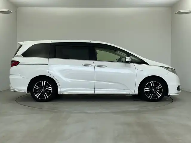 ホンダ オデッセイ ハイブリッド アブソルートセンシングアドバンP 新潟県 2016(平28)年 6.6万km ホワイトオーキッドパール メーカー純正インターナビ/(CD.DVD.フルセグ.Bluetooth)/全方位カメラ/革巻きステアリング/ステアリングリモコン/LEDオートライト/フォグランプ/ホンダセンシング/レーダークルーズコントロール/レーンキープアシスト/ハーフレザーシート/運転席パワーシート/EVモード/電動格納ウィンカーミラー/ECON/プッシュスタート/スマートキー×2/純正フロアマット