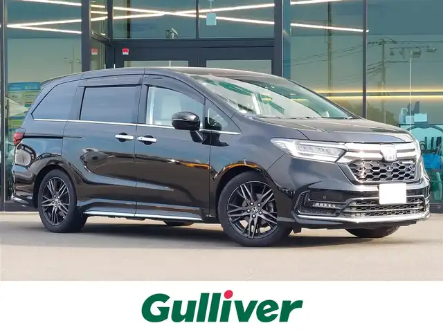 ホンダ オデッセイ アブソルート EX 東京都 2022(令4)年 2.5万km プレミアムスパークルブラックパール Honda SENSING/・衝突軽減ブレーキ/・誤発進抑制機能/・標識認識機能/・路外逸脱抑制機能/・車線維持支援システム/・先行車発進お知らせ機能/・アダプティブクルーズコントロール/・オートハイビーム/・ブラインドスポットインフォメーション/・マルチビューカメラシステム/・スマートパーキングアシストシステム/プッシュスタート/アイドリングストップ/パドルシフト/純正ナビ/フルセグTV/ビルトインETC2.0/ドライブレコーダー/GPSレーダー/両側パワースライドドア/パワーテールゲート/レザー調シートカバー/シートヒーター/オットマン/LEDヘッドライト/ドアバイザー/18インチ純正アルミホイール