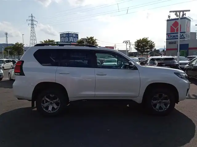 トヨタ ランドクルーザー プラド TX Lパッケージ ブラックED 福井県 2021(令3)年 5.1万km ホワイトパールクリスタルシャイン 衝突被害軽減システム/先行車発進告知/標識検知/純正SDナビ（NSCN-W68）/・（ワンセグTV/CD/DVD/Bluetooth）/バックカメラ/ETC/D・N席パワーシート/D・N席シートヒーター・クーラー/ステアリングスイッチ/オートLEDライト/電動格納ウィンカーミラー/純正フロアマット/スマートキー