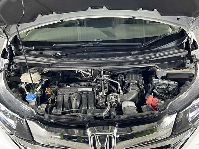 ホンダ フリード ハイブリット G ホンダセンシング 沖縄県 2019(平31)年 5.9万km ホワイトオーキッドパール 県外仕入れ/禁煙車/両側パワースライドドア/純正9インチナビ/（フルセグTV/CD/DVD/BT/FM/AM）/バックカメラ/社外フロントカメラ/ステアリングリモコン/ホンダセンシング/オートライト/前後ドライブレコーダー/コーナーセンサー/電動格納ウィンカーミラー/純正フロアマット/ドアバイザー