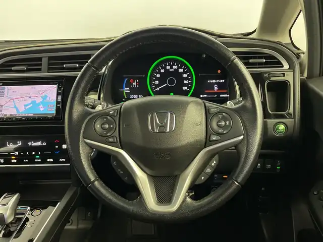 ホンダ シャトル ハイブリッド X ホンダセンシング 鹿児島県 2018(平30)年 6万km ミッドナイトブルービームM 純正ナビ（CD/DVD/BT/フルセグテレビ）/レーダークルーズコントロール/オートライト/ハーフレザーシート/パドルシフト/シートヒーター/ホンダセンシング/バックカメラ/ドラレコ/スマートキー/プッシュスタート/ETC/ステアリングリモコン