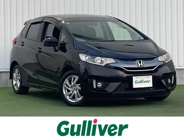ホンダ フィット 13G Sパッケージ 香川県 2014(平26)年 9.8万km クリスタルブラックパール ディーラーナビ/→CD.DVD/Bluetooth/フルセグTV/バックカメラ/ルーフスポイラー/LEDオートヘッドライト/純正15インチアルミホイール/ETC/パドルシフト/電格ウィンカーミラー/アイドリングストップ/横滑り防止装置/ドアバイザー/純正フロアマット/ステアリングリモコン/ルーフスポイラー/スマートキー/スペアキー/プッシュスタート