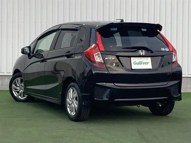 ホンダ フィット 13G Sパッケージ 香川県 2014(平26)年 9.8万km クリスタルブラックパール ディーラーナビ/→CD.DVD/Bluetooth/フルセグTV/バックカメラ/ルーフスポイラー/LEDオートヘッドライト/純正15インチアルミホイール/ETC/パドルシフト/電格ウィンカーミラー/アイドリングストップ/横滑り防止装置/ドアバイザー/純正フロアマット/ステアリングリモコン/ルーフスポイラー/スマートキー/スペアキー/プッシュスタート