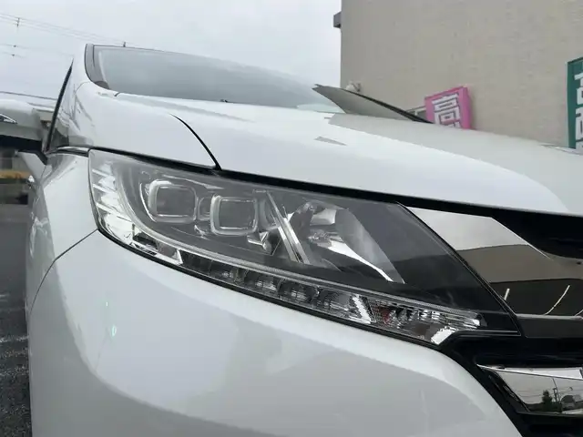 ホンダ オデッセイ アブソルート・EXホンダセンジング 大阪府 2016(平28)年 2.4万km パール DVDナビ/バックカメラ/ウィンカーミラー/クルーズコントロール/プッシュスタート/両側パワースライドドア/ETC