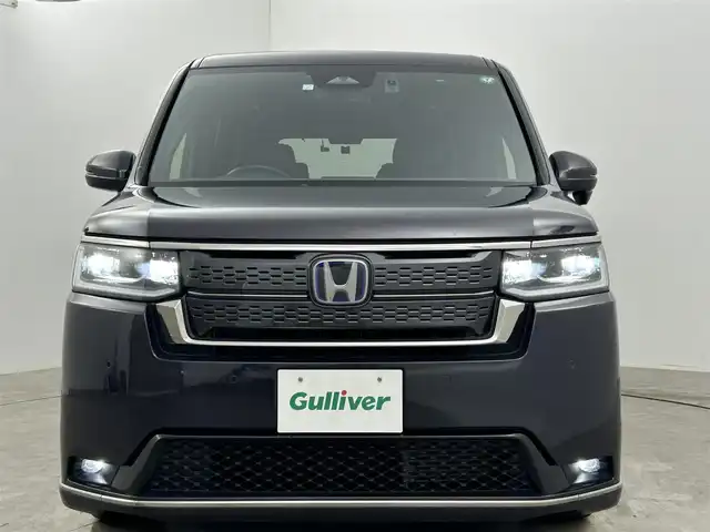 ホンダ ステップワゴン スパーダ eHEV 岡山県 2023(令5)年 2.9万km トワイライトミストブラックパール 純正８インチナビ/（CD/DVD/BT/USB/フルセグ）/衝突軽減ブレーキ/両側電動スライド/追従型クルーズコントロール/ビルトインＥＴＣ/シートヒーター（前席・中席）/ＬＥＤヘッドライト/オートハイビーム/オートライト/コーナーセンサー（前・後）/プッシュスタート/スマートキー×１/アイドリングストップ/レーンキープアシスト/純正16インチAW/踏み間違い防止/オートブレーキホールド/ブラインドスポットモニター/ISOFIX/後席サンシェイド/ステアリングスイッチ/チルトステアリング/シートリフター/シートバックテーブル/ウインカーミラー/バックカメラ/ドライブレコーダー（前・後）/デジタルインナーミラー/電動リアゲート