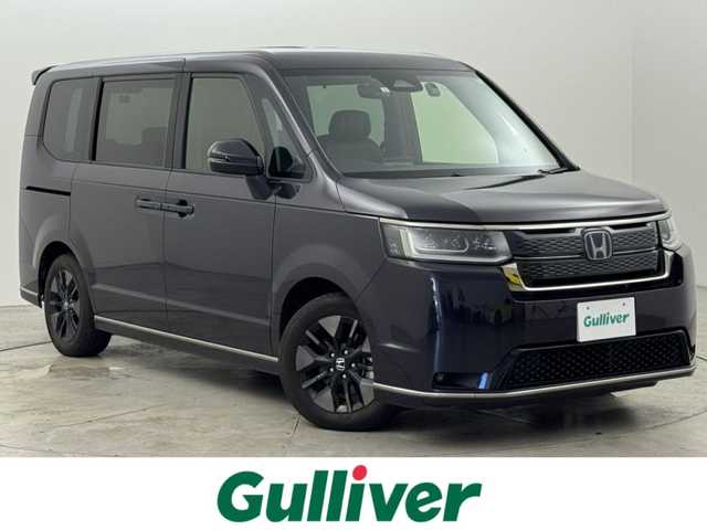 ホンダ ステップワゴン スパーダ eHEV 福岡県 2023(令5)年 2.9万km トワイライトミストブラックパール 純正８型ナビ／フルセグＴＶ　/バックカメラ　/デジタルルームミラー　/アダプティブクルーズコントロール　/コーナーセンサー　/衝突軽減ブレーキ　/レーンキープ　/ＢＳＭ　ア/クセル踏み間違い防止　/両側電動スライドドア　/パワーバックドア　/シートヒーター　/ハーフレザーシート　/純正１６インチアルミホイール　/ＬＥＤヘッドライト