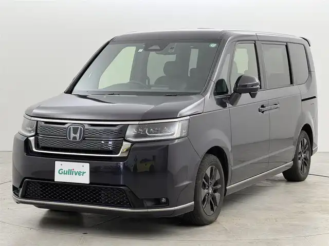 ホンダ ステップワゴン スパーダ eHEV 福岡県 2023(令5)年 2.9万km トワイライトミストブラックパール 純正８型ナビ／フルセグＴＶ　/バックカメラ　/デジタルルームミラー　/アダプティブクルーズコントロール　/コーナーセンサー　/衝突軽減ブレーキ　/レーンキープ　/ＢＳＭ　ア/クセル踏み間違い防止　/両側電動スライドドア　/パワーバックドア　/シートヒーター　/ハーフレザーシート　/純正１６インチアルミホイール　/ＬＥＤヘッドライト