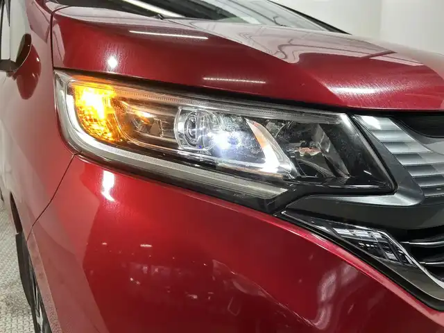 ホンダ フリード G ホンダセンシング 大阪府 2018(平30)年 3.7万km プレミアムクリスタルレッドM 衝突軽減　両側パワスラ　フリップダウンモニター　ＥＴＣ レーダークルコン ハーフレザーシート/ レーンアシスト LEDヘッドライト プッシュスタート オートライト AC 電動ミラー 純正AW