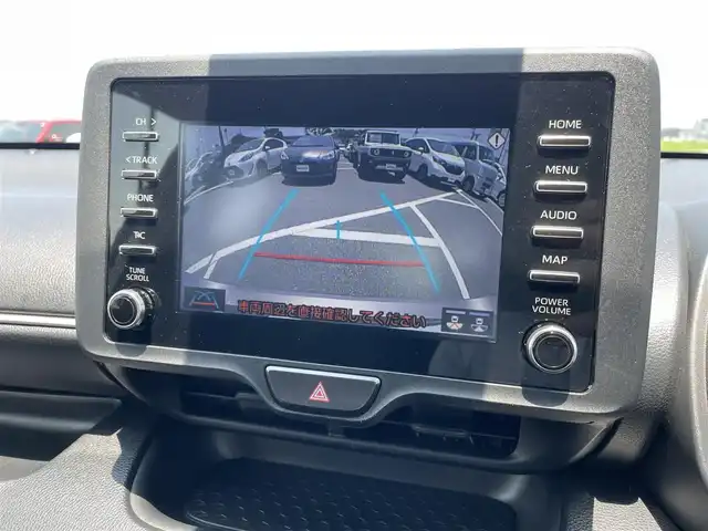 トヨタ ヤリス ハイブリッド X 鳥取県 2021(令3)年 5.9万km アバンギャルドブロンズメタリック 純正ナビ／ＢＴ／ＵＳＢ/バックカメラ・ＥＴＣ/トヨタセーフティセンス/レーダークルーズ/レーンアシスト/オートハイビーム/オートライト/プッシュスタート/社外１６インチアルミホイール/ウィンカーミラー/電動格納ミラー/アイドリングストップ/スマートキーｘ２/フロアマット