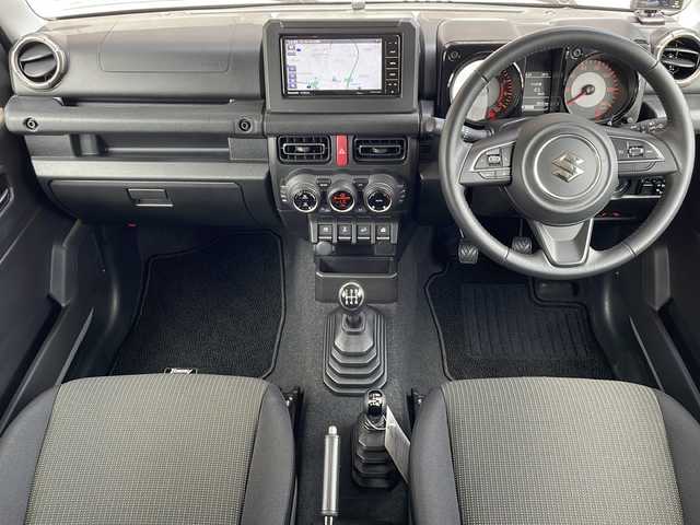 スズキ ジムニー XC 長野県 2023(令5)年 0.8万km ミディアムグレー ４WD/スズキセーフティサポート/ストラーダメモリナビフルセグTV/ドライブレコーダー/ETC/シートヒーター /純正16インチアルミ/社外マフラー/純正マフラー積込/ワンオーナー /保証書・取説/スペアキー