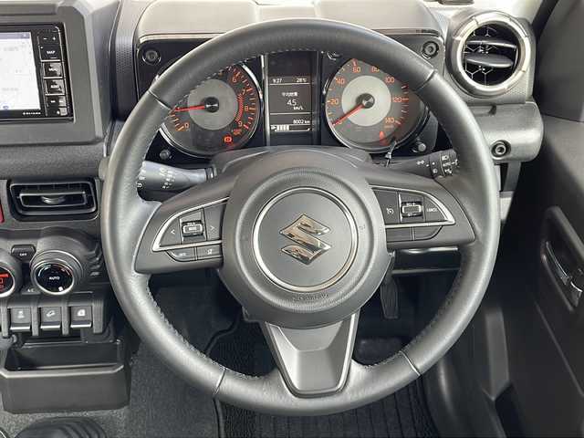 スズキ ジムニー XC 長野県 2023(令5)年 0.8万km ミディアムグレー ４WD/スズキセーフティサポート/ストラーダメモリナビフルセグTV/ドライブレコーダー/ETC/シートヒーター /純正16インチアルミ/社外マフラー/純正マフラー積込/ワンオーナー /保証書・取説/スペアキー