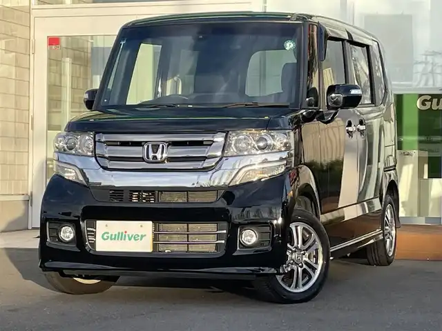 ホンダ Ｎ ＢＯＸ カスタム G Lパッケージ 道央・札幌 2016(平28)年 7.3万km スマートブラック ・４WD/・片側パワースライドドア/・純正ナビ/　CD＆DVD＆BT＆TV/・バックカメラ/・オートライト/・オートエアコン/・ミラーヒーター/・オートリトラミラー/・シートヒーター/・社外エンジンスターター/・プッシュスタート/・スマートキー/・ビルトインETC/・純正フロアマット/・ドアバイザー/・フォグライト/・HIDヘッドライト/・スペアキー×１