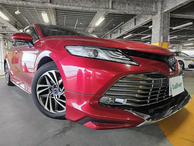 トヨタ カムリ G 宮崎県 2018(平30)年 8.4万km エモーショナルレッド ワンオーナー/パノラマムーンルーフ/純正9型ナビ/フルセグTV/バックカメラ/ビルトインETC/ドライブレコーダー/レーダークルーズコントロール/セーフティセンスP/・衝突被害軽減ブレーキ/・車線逸脱警報/・オートマチックハイビーム/LEDヘッドランプ/革巻きステアリング/ステアリングスイッチ/運転席パワーシート/モデリスタエアロ(F/S/R)/モデリスタ17インチアルミホイール/スマートキー/プッシュエンジンスタート/禁煙車