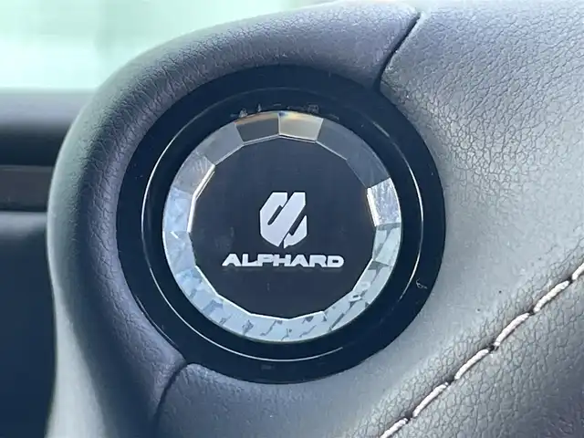 トヨタ アルファードハイブリット Z 香川県 2023(令5)年 3.1万km プラチナホワイトパールマイカ メーカーナビ/１３．２型後席モニター/全方位カメラ/チームメイト/モデリスタエアロ　　/独立ムーンルーフ　/トヨタセーフティセンス　/パワーバックドア　/両側パワースライドドア　/黒革シート/前席シートオプション/・シートヒーター/・エアシート/・パワーシート/運転席メモリ付きシート/デジタルインナーミラー/BSM　/ＨＵＤ　/ＬＥＤヘッドライト/オートライト/オートハイビーム　/ワイヤレス充電　/ビルトインＥＴＣ2.0/前後ドライブレコーダー