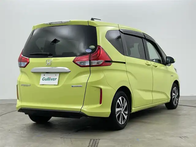 ホンダ フリード＋ ハイブリット EX 岡山県 2016(平28)年 3.2万km シトロンドロップ 純正ナビ(VXM-175VFi)/(Bluetooth/CD/DVD/フルセグTV)/両側電動スライド/バックカメラ/ハーフレザー/コーナーセンサー(前後)/シートヒーター(運転席・助手席)/LEDヘッドライト/レーダークルーズコントロール/スマートキー(1本)/ビルトインETC/社外ドライブレコーダー(前)/禁煙車/レーンアシスト/純正15インチアルミホイール/純正フロアマット