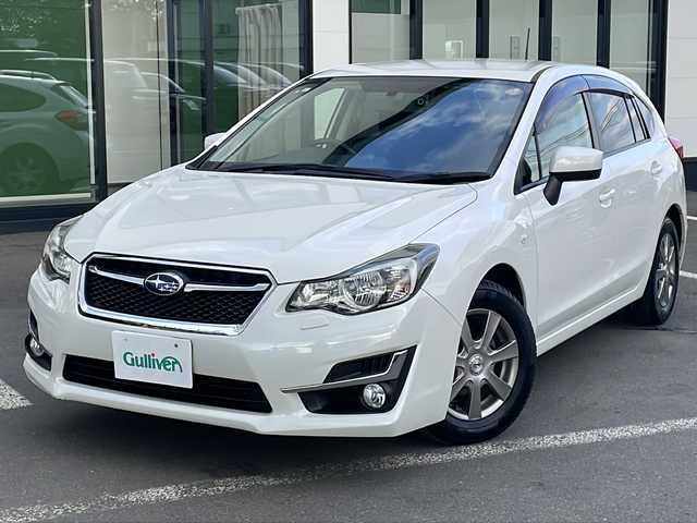 スバル インプレッサ スポーツ 1．6i－L 道東・釧路十勝 2015(平27)年 7.2万km クリスタルホワイトP ・４WD/・社外メモリナビ/（CD・DVD・フルセグ・USB・Bluetooth）/・バックカメラ/・社外ドライブレコーダー/・スマートキー/・プッシュスタート/・パドルシフト/・横滑り防止装置/・アイドリングストップ/・オートエアコン/・ETC/・HIDヘッドランプ/・フォグランプ/・ドアバイザー/・純正フロアマット