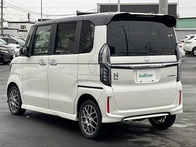 ホンダ Ｎ ＢＯＸ カスタム G EX ターボ ホンダセンシング 道北・旭川 2017(平29)年 8.2万km プレミアムホワイトパールⅡ 4WD/純正SDナビ/ CD/DVD/SD/MSV/USB/BT/フルセグ/バックカメラ/衝突軽減ブレーキ/レーンキープ /レーダークルーズコントロール/パドルシフト/両側パワースライドドア/シートヒーター /ハーフレザー/ビルトインETC/ミラーヒーター /オートライト/LEDヘッドライト/フォグライト/オートリトラミラー /USBポート/サンシェード/純正フロアマット/レオニス15インチアルミホイール/無限グリル