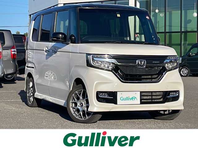 ホンダ Ｎ ＢＯＸ カスタム G EX ターボ ホンダセンシング 道央・札幌 2017(平29)年 8.2万km プレミアムホワイトパールⅡ ４WD/純正ディーラーOPナビ/CD/DVD/BT/フルセグ/ホンダセンシング/衝突被害軽減ブレーキ/横滑り防止装置/アダプティブクルーズコントロール/レーンキープアシスト/リアコーナーセンサー/バックカメラ/ビルトインETC/ECONモード/両側パワースライドドア/前席シートヒーター/ハーフレザーシート/ステアリングリモコン/パドルシフト/プッシュスタート/スマートキー/純正リモートスタート/LEDヘッドライト/オートライト/オートハイビーム/フォグランプ/電動格納ミラー/ヒーテッドドアミラー/ウィンカーミラー/純正フロアマット
