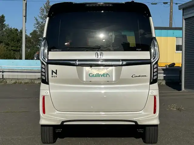 ホンダ Ｎ ＢＯＸ カスタム G EX ターボ ホンダセンシング 道央・札幌 2017(平29)年 8.2万km プレミアムホワイトパールⅡ ４WD/純正ディーラーOPナビ/CD/DVD/BT/フルセグ/ホンダセンシング/衝突被害軽減ブレーキ/横滑り防止装置/アダプティブクルーズコントロール/レーンキープアシスト/リアコーナーセンサー/バックカメラ/ビルトインETC/ECONモード/両側パワースライドドア/前席シートヒーター/ハーフレザーシート/ステアリングリモコン/パドルシフト/プッシュスタート/スマートキー/純正リモートスタート/LEDヘッドライト/オートライト/オートハイビーム/フォグランプ/電動格納ミラー/ヒーテッドドアミラー/ウィンカーミラー/純正フロアマット