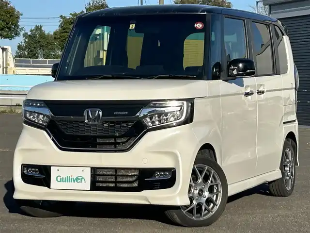 ホンダ Ｎ ＢＯＸ カスタム G EX ターボ ホンダセンシング 道央・札幌 2017(平29)年 8.2万km プレミアムホワイトパールⅡ ４WD/純正ディーラーOPナビ/CD/DVD/BT/フルセグ/ホンダセンシング/衝突被害軽減ブレーキ/横滑り防止装置/アダプティブクルーズコントロール/レーンキープアシスト/リアコーナーセンサー/バックカメラ/ビルトインETC/ECONモード/両側パワースライドドア/前席シートヒーター/ハーフレザーシート/ステアリングリモコン/パドルシフト/プッシュスタート/スマートキー/純正リモートスタート/LEDヘッドライト/オートライト/オートハイビーム/フォグランプ/電動格納ミラー/ヒーテッドドアミラー/ウィンカーミラー/純正フロアマット