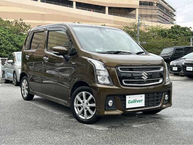 スズキ ワゴンＲ スティングレー HYBRID X 沖縄県 2018(平30)年 5.5万km ブレイブカーキP ワンオーナー/純正ナビ　/　（ＡＭ／ＦＭ／ＣＤ／ＤＶＤ／ＢＴ）　/フルセグＴＶ　/全周囲カメラ　/衝突軽減　/レーンキープ　/シートヒーター　/ＨＵＤ　/LEDヘッドライト/フォグ/オートライト　/純正フロアマット　/純正14インチAW　/スマートキー2本　/前後ドラレコ