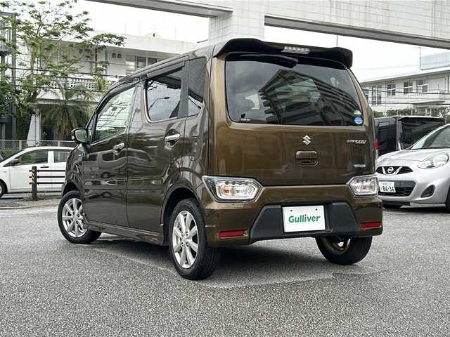 スズキ ワゴンＲ スティングレー HYBRID X 沖縄県 2018(平30)年 5.5万km ブレイブカーキP ワンオーナー/純正ナビ　/　（ＡＭ／ＦＭ／ＣＤ／ＤＶＤ／ＢＴ）　/フルセグＴＶ　/全周囲カメラ　/衝突軽減　/レーンキープ　/シートヒーター　/ＨＵＤ　/LEDヘッドライト/フォグ/オートライト　/純正フロアマット　/純正14インチAW　/スマートキー2本　/前後ドラレコ