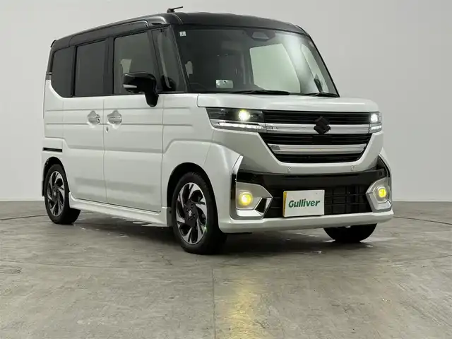 スズキ スペーシア カスタム HYBRID XS ターボ 愛知県 2024(令6)年 1.3万km ピュアホワイトパール/ブラック2トーン デュアルセンサーサポートブレーキII/・誤発進抑制機能/・後方誤発進抑制機能/・低速時ブレーキサポート/・パーキングセンサー/・車線逸脱警報機能/・車線逸脱抑制機能/・ふらつき警報機能/・発進お知らせ機能/・標識認識機能/・ヘッドアップディスプレイ/・アダプティブクルーズコントロール/・車線維持支援機能/純正9インチナビ/（Bluetooth/フルセグTV/DVD/USB/HDMI）/アルパイン後席用9インチモニター/全方位カメラ/ヘッドアップディスプレイ/シートヒーター/ステアリングヒーター/サーキュレーター/ETC2.0/テレビキャンセラー/パドルシフト/ロールサンシェード/電子パーキング/純正フロアマット/純正LEDライト/純正15インチAW/後席テーブル