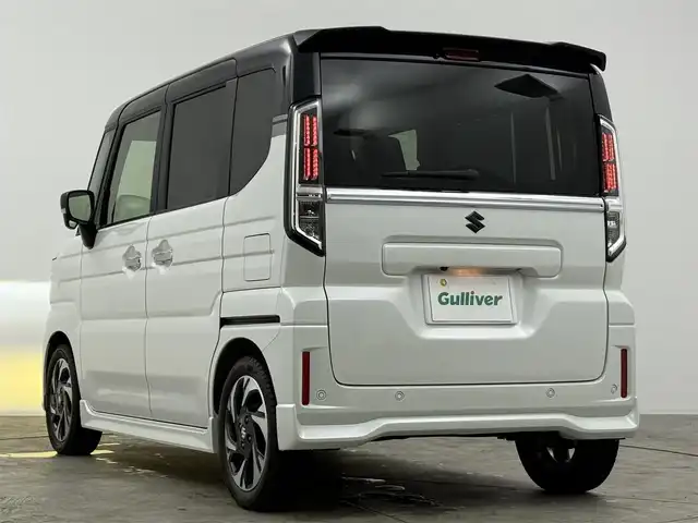 スズキ スペーシア カスタム HYBRID XS ターボ 愛知県 2024(令6)年 1.3万km ピュアホワイトパール/ブラック2トーン デュアルセンサーサポートブレーキII/・誤発進抑制機能/・後方誤発進抑制機能/・低速時ブレーキサポート/・パーキングセンサー/・車線逸脱警報機能/・車線逸脱抑制機能/・ふらつき警報機能/・発進お知らせ機能/・標識認識機能/・ヘッドアップディスプレイ/・アダプティブクルーズコントロール/・車線維持支援機能/純正9インチナビ/（Bluetooth/フルセグTV/DVD/USB/HDMI）/アルパイン後席用9インチモニター/全方位カメラ/ヘッドアップディスプレイ/シートヒーター/ステアリングヒーター/サーキュレーター/ETC2.0/テレビキャンセラー/パドルシフト/ロールサンシェード/電子パーキング/純正フロアマット/純正LEDライト/純正15インチAW/後席テーブル
