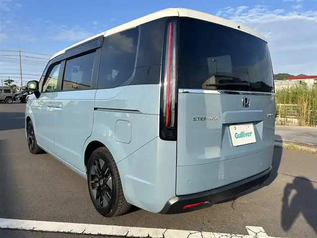 ホンダ ステップワゴン eHEV エアー 岡山県 2022(令4)年 4.9万km シーグラスブルーパール 登録時走行距離48813km/純正11.4インチナビ/純正15.6インチフリップダウンモニター/フルセグTV(AM.FM.CD.DVD.TV.BT)/ホンダセンシング/両側パワースライドドア/全方位カメラ/ETC/前後ドライブレコーダー/クリアランスソナー/衝突軽減ブレーキ/横滑り防止装置/レーダークルーズコントロール/レーンキープアシスト/電子パーキングシステム/ブレーキホールドシステム/オートライト/アイドリングストップ/16インチ純正AW/純正フロアマット