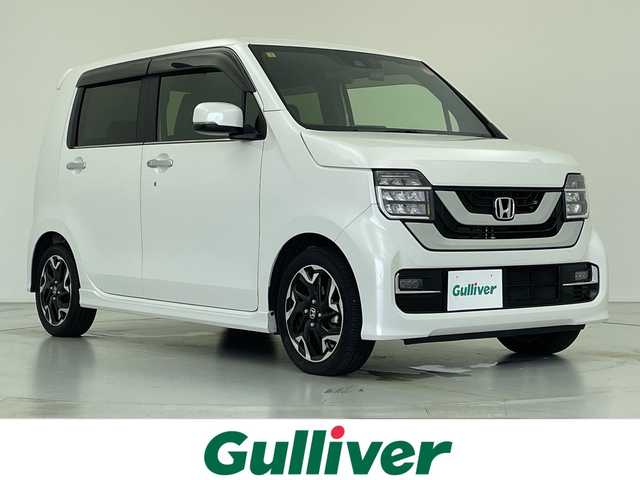 ホンダ Ｎ ＷＧＮ Lターボ ホンダセンシング 愛知県 2021(令3)年 1.9万km プラチナホワイトパール 純正ナビ/・フルセグ/・Bluetooth/・CD/DVD/・FM/AM/・SD音楽録音/バックカメラ/前後ドライブレコーダ/ビルドインETC/ホンダセンシング/衝突軽減ブレーキ（CMBS）/先行車発進お知らせ機能/路外逸脱抑制機能/標識認識機能/アダプティブクルーズコントロール（ACC）/車線維持支援システム（LKAS）/前後誤発進抑制機能/パーキングセンサー