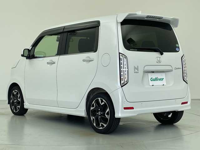 ホンダ Ｎ ＷＧＮ Lターボ ホンダセンシング 愛知県 2021(令3)年 1.9万km プラチナホワイトパール 純正ナビ/・フルセグ/・Bluetooth/・CD/DVD/・FM/AM/・SD音楽録音/バックカメラ/前後ドライブレコーダ/ビルドインETC/ホンダセンシング/衝突軽減ブレーキ（CMBS）/先行車発進お知らせ機能/路外逸脱抑制機能/標識認識機能/アダプティブクルーズコントロール（ACC）/車線維持支援システム（LKAS）/前後誤発進抑制機能/パーキングセンサー
