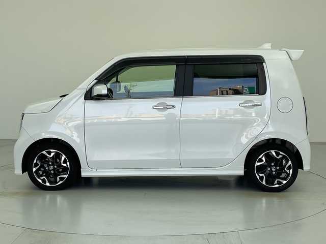 ホンダ Ｎ ＷＧＮ Lターボ ホンダセンシング 愛知県 2021(令3)年 1.9万km プラチナホワイトパール 純正ナビ/・フルセグ/・Bluetooth/・CD/DVD/・FM/AM/・SD音楽録音/バックカメラ/前後ドライブレコーダ/ビルドインETC/ホンダセンシング/衝突軽減ブレーキ（CMBS）/先行車発進お知らせ機能/路外逸脱抑制機能/標識認識機能/アダプティブクルーズコントロール（ACC）/車線維持支援システム（LKAS）/前後誤発進抑制機能/パーキングセンサー