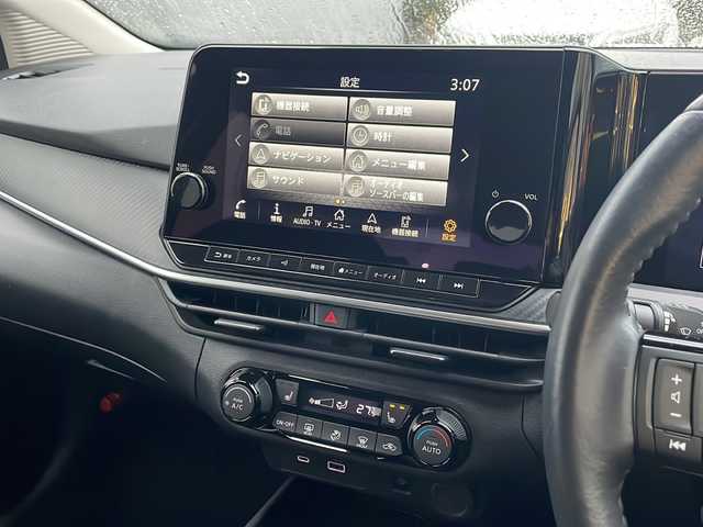 日産 ノート X FOUR 青森県 2023(令5)年 6.6万km ダークメタルグレー ・4WD/・純正ナビ/・全方位カメラ/・フルセグ/・Bluetooth/・横滑り防止/・衝突被害軽減ブレーキ/・レーンキープアシスト/・レーダークルーズコントロール/・オートライト/・オートマチックハイビーム/・LEDヘットライト/・プッシュスタート/・スマートキー/・スペアキー１本/・デジタルインナーミラー/・電動格納ウィンカーミラー/・シートヒーター/・ハンドルヒーター（前席）/・置くだけ充電/・純正フロアマット