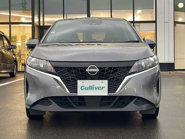 日産 ノート X FOUR 青森県 2023(令5)年 6.6万km ダークメタルグレー ・4WD/・純正ナビ/・全方位カメラ/・フルセグ/・Bluetooth/・横滑り防止/・衝突被害軽減ブレーキ/・レーンキープアシスト/・レーダークルーズコントロール/・オートライト/・オートマチックハイビーム/・LEDヘットライト/・プッシュスタート/・スマートキー/・スペアキー１本/・デジタルインナーミラー/・電動格納ウィンカーミラー/・シートヒーター/・ハンドルヒーター（前席）/・置くだけ充電/・純正フロアマット