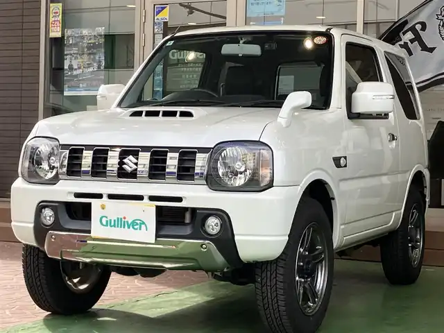 スズキ ジムニー ランドベンチャー 神奈川県 2018(平30)年 2.7万km パールホワイト 1オーナー/社外SDナビ(CN-RA04D)/バックカメラ/レザーシート/運転席シートヒーター/carrozerriaサブウーファー/前後ドライブレコーダー/社外LEDヘッドライト/背面タイヤハードカバー