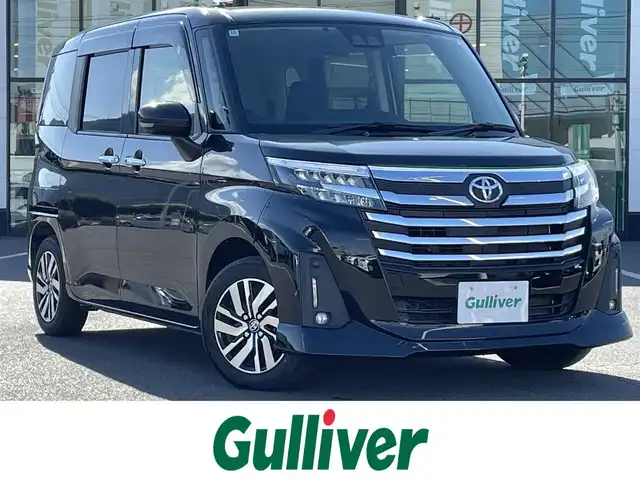 トヨタ ルーミー カスタムG 岡山県 2020(令2)年 5.1万km ブラックマイカメタリック 登録時走行距離50850km/純正ディスプレイオーディオ/(Bluetooth/AM/FM/USB)/バックカメラ/アダプティブクルーズコントロール/プリクラッシュセーフティシステム/クリアランスソナー/両側パワースライドドア/100ボルト電源/純正LEDライト/オートライト/オートハイビーム/電動パーキングブレーキ/ブレーキホールド/オートエアコン/純正14インチアルミホイール/プッシュスタート/スマートキー