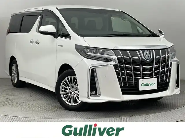 トヨタ アルファードハイブリット SR Cパッケージ 道央・札幌 2020(令2)年 5.1万km ホワイトパールクリスタルシャイン ・４WD/・純正ディスプレイオーディオ/　ナビTVキット/CD/DVDデッキ/・純正フリップダウンモニター/・デジタルインナーミラー/・バックカメラ/・前後ドライブレコーダー/・トヨタセーフティセンス/・プリクラッシュセーフティ/・レーダークルーズコントロール/・レーンキープアシスト/・クリアランスソナー/・オートハイビーム/・BSM/・RSA/・RCTA/・nanoe/・レザーシート/・前席シートヒーター/・前席エア/シートヒーター/・LEDヘッドライト/・フォグライト/・オートライト/・プッシュスタート/・スマートキー/・純正フロアマット/・ドアバイザー