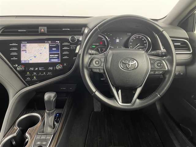トヨタ カムリ G 埼玉県 2020(令2)年 6.6万km プラチナホワイトパールマイカ 純正7型ナビ/・AM/FM/USB/Bluetooth/miracast)/バックカメラ/Toyota Safety Sense/・プリクラッシュセーフティシステム/・レーンディパーチャーアラート(ステアリング制御機能付)/・オートマチックハイビーム/・レーダークルーズコントロール(全車速追従機能付)/インテリジェントクリアランスソナー(パーキングサポートブレーキ)/LEDヘッドランプ/LEDフォグランプ/ビルトインETC/電動リアゲート/パワーシート席/社外ドラレコ前後