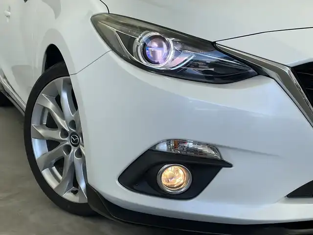 マツダ アクセラ スポーツ 15S 新潟県 2015(平27)年 9.7万km スノーフレイクホワイトパールマイカ マツダコネクトナビ/　フルセグTV/Bluetooth/CD/DVD/USB/マツダスピードエアロ/リアビークルモニタリングシステム/衝突被害軽減ブレーキ/クルーズコントロール/ドライブレコーダー/バックモニター/ETC/アイドリングストップ/横滑り防止装置/ステアリングスイッチ/レザーステアリング/社外AWセット冬タイヤ積込