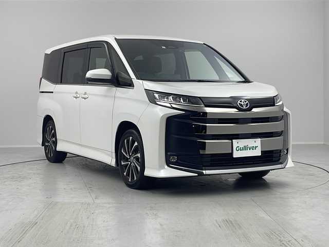 トヨタ ノア ハイブリッド S－Z 茨城県 2023(令5)年 1.6万km ホワイトパールクリスタルシャイン トヨタセーフティーセンス/純正10インチメモリナビ/　　CD/BT/フルセグ/バックカメラ/両側パワースライドドア/ユニバーサルステップ/レーダークルーズコントロール/LEDオートライト/ハーフレザーシート/シートヒーター/純正17インチアルミホイール/デジタルインナーミラー/ステアリングスイッチ/USBポート/ビルトインETC2.0/禁煙車