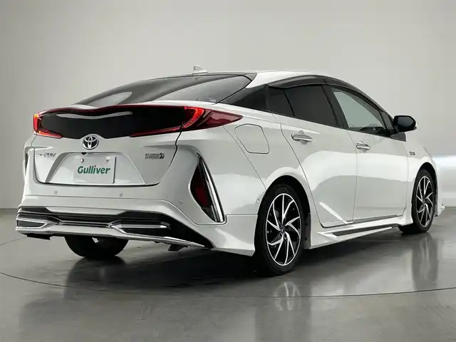 トヨタ プリウス ＰＨＶ A 愛知県 2017(平29)年 5.3万km ホワイトパールクリスタルシャイン 純正１１．６型ナビ　バックカメラ　フルセグTV　Bluetooth　モデリスタエアロ　シートヒーター　パーキングアシスト　ＢＳＭ　ＥＴＣ２．０　純正ドラレコ　ＡＣ１００Ｖ　セーフティセンス　衝突軽減　追従クルコン　ＬＥＤライト　コーナーセンサー　モデリスタ17インチアルミ　USBポート　禁煙