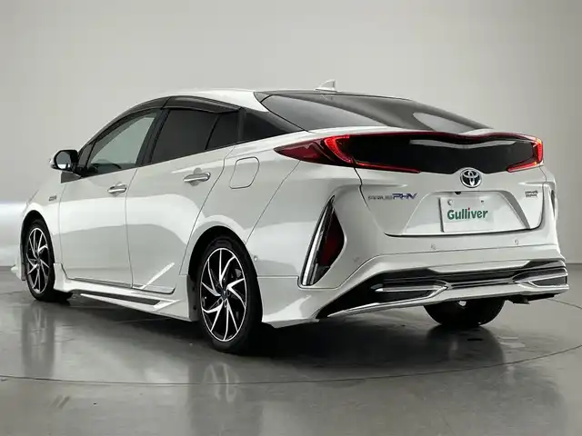 トヨタ プリウス ＰＨＶ A 愛知県 2017(平29)年 5.3万km ホワイトパールクリスタルシャイン 純正１１．６型ナビ　バックカメラ　フルセグTV　Bluetooth　モデリスタエアロ　シートヒーター　パーキングアシスト　ＢＳＭ　ＥＴＣ２．０　純正ドラレコ　ＡＣ１００Ｖ　セーフティセンス　衝突軽減　追従クルコン　ＬＥＤライト　コーナーセンサー　モデリスタ17インチアルミ　USBポート　禁煙