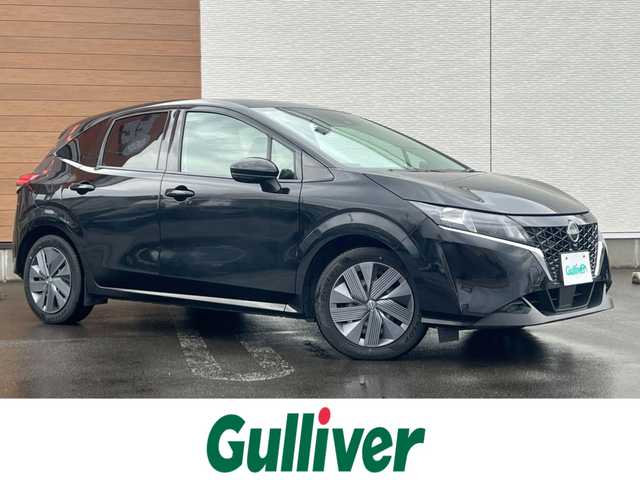 日産 ノート X FOUR 秋田県 2023(令5)年 7.3万km スーパーブラック ４WD/衝突軽減システム/純正メモリナビ（BT/AM/FM/USB）/フルセグ（走行中視聴不可能）/アラウンドビューモニター/スマートキー/プッシュスタート/クルーズコントロール追従走行有/オートマチックハイビーム/コーナーセンサー/ステアリングスイッチ/ステアリングヒーター/前席シートヒーター/ビルトインETC２．０/デジタルインナーミラー/電動パーキングブレーキ/オートブレーキホールド機能/純正フロアマット/オートライト/オートエアコン/パワーステアリング/パワーウィンドウ/ヘッドライトレベライザー/横滑り防止/盗難防止装置/寒冷地仕様/電動格納ウィンカーミラー/保証書/取扱説明書/記録簿
