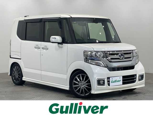 ホンダ Ｎ ＢＯＸ カスタム ターボ SSパッケージ 栃木県 2016(平28)年 4.3万km プレミアムホワイトパールⅡ 社外ナビ/(CD/フルセグTV/Bluetooth/MSV/SD)/前後ドラレコルームミラータイプ/バックカメラ/ETC/ローダウン/ハーフレザーシート/衝突軽減ブレーキ/シートヒーター/純正フロアマット/HIDヘッドライト/オートライト/横滑り防止装置/プッシュスタート/スマートキー/ステアリングスイッチ/革巻きステアリング/社外15インチアルミホイール