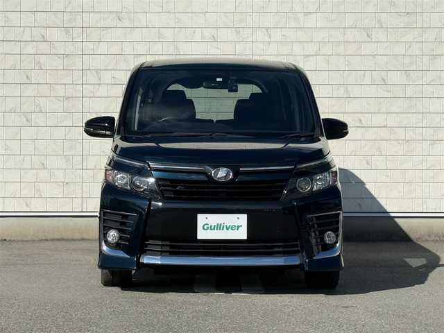トヨタ ヴォクシー ZS 福岡県 2014(平26)年 4.8万km ブラッキッシュアゲハガラスフレーク 禁煙車純正９型SDナビ（フルセグTV/DVD/CD/BT）バックモニター両側パワスラフリップダウンモニターアイドリングストップドラレコETCLEDヘッドライトスマートキー×２社外１７インチAW