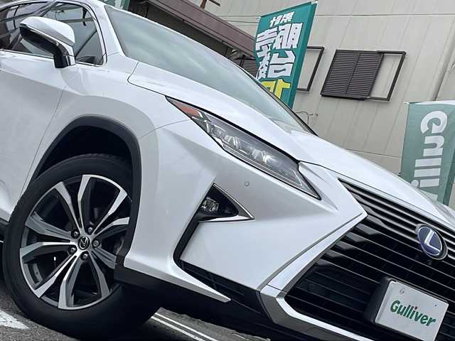 レクサス ＲＸ 450h バージョンL 兵庫県 2019(平31)年 2.7万km ソニッククォーツ 登録時走行距離26250km/純正12.3インチSDナビ/プレミアムサウンドシステム/フルセグTV/DVD/Blu-ray/USB端子/Bluetooth/パノラミックビューモニター/セーフティシステムプラス/インテリジェントクリアランスソナー/リアクロストラフィックアラート/リアクロストラフィックオートブレーキ/ブラインドスポットモニター/角型3眼LEDヘッドランプ/ノーブルブラウンセミアニリン革シート/コンフォータブルエアシート(運転席/助手席)シートヒーター（運転席/助手席/後席）/ビルトインETC2.0/スペアタイヤ/ステアリングヒーター/LEDシーケンシャルターンランプ/カードキー1個/スマートキー2個/ヘッドアップディスプレイ/純正フロアマット/純正ドライブレコーダー