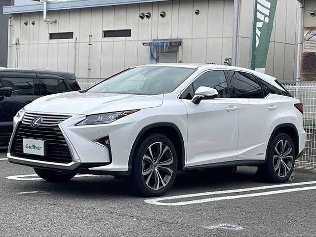 レクサス ＲＸ 450h バージョンL 兵庫県 2019(平31)年 2.7万km ソニッククォーツ 登録時走行距離26250km/純正12.3インチSDナビ/プレミアムサウンドシステム/フルセグTV/DVD/Blu-ray/USB端子/Bluetooth/パノラミックビューモニター/セーフティシステムプラス/インテリジェントクリアランスソナー/リアクロストラフィックアラート/リアクロストラフィックオートブレーキ/ブラインドスポットモニター/角型3眼LEDヘッドランプ/ノーブルブラウンセミアニリン革シート/コンフォータブルエアシート(運転席/助手席)シートヒーター（運転席/助手席/後席）/ビルトインETC2.0/スペアタイヤ/ステアリングヒーター/LEDシーケンシャルターンランプ/カードキー1個/スマートキー2個/ヘッドアップディスプレイ/純正フロアマット/純正ドライブレコーダー