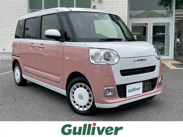 ダイハツ ムーヴ キャンバス ストライプス G ターボ 鳥取県 2022(令4)年 1.6万km シャイニングホワイトパール/アプリコットピンクメタリック スマートアシスト/純正9型ディスプレイオーディオ/・フルセグ/・Bluetooth/・HDMI/バックカメラ/両側電動スライドドア/スマートキー/プッシュスタート/レーダークルーズ/ターボ/前席シートヒーター/カップヒーター/ABS/横滑り防止装置/前後ソナー/オートライト/LEDヘッドライト/W＆サイドエアバック/カーテンエアバック